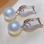 Huitan-2022-Trend-Imitation-Pearl-Dangle-Earring-for-Women-Luxury-Silver-Color-Bling-Cubic-Zirconia-Fashion.webp
